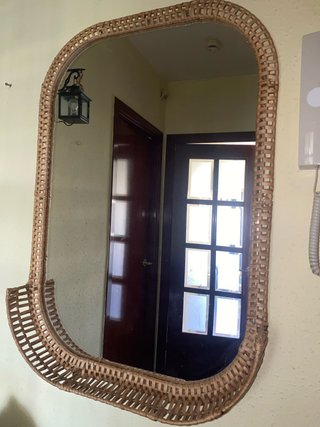 Espejo de mimbre ovalado