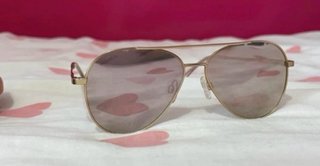 Gafas de sol Hawkers doradas y rosas