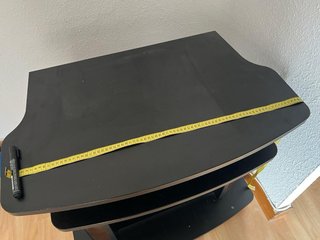 Mueble TV negro con ruedas