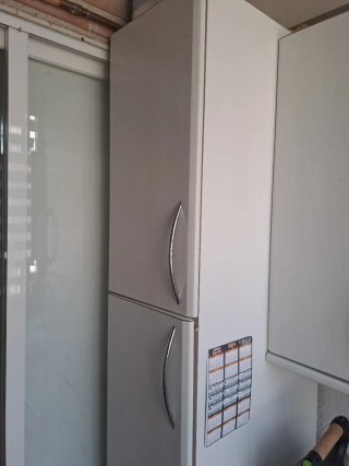 Muebles de cocina azules y blancos