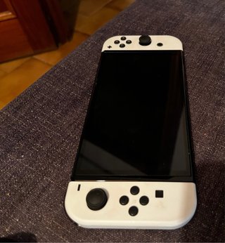 Nintendo Switch OLED + SD 64GB + Giochi