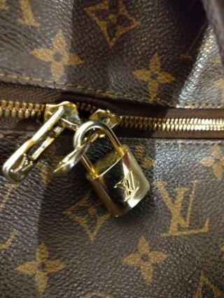 Louis Vuitton borsone monogram marrone