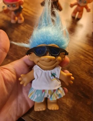 Vari pupazzi Trolls