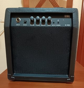 Bajo Eléctrico Negro y Amplificador