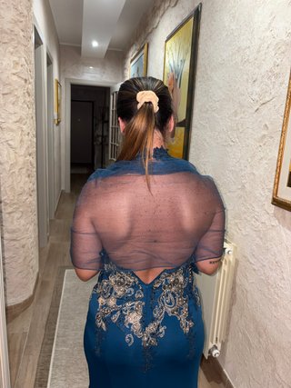 Abito da sera blu e oro