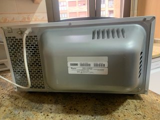 Microondas Whirlpool con grill y función crisp.