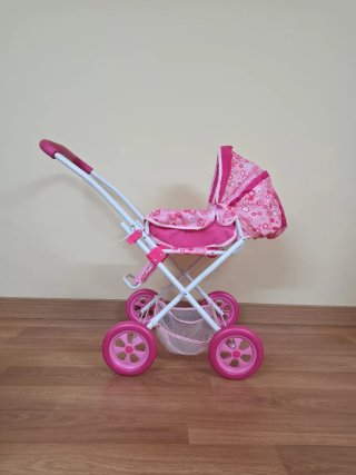 Carrito de muñecas rosa
