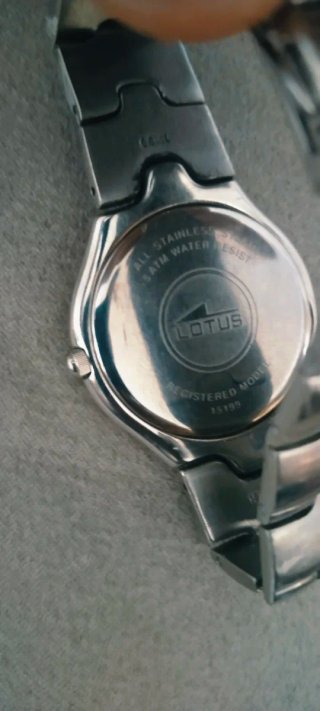 Reloj Lotus Plata y Blanco