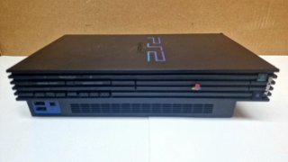 Lote PlayStation 2 con Singstar y Buzz