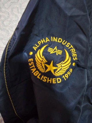 Chaqueta Alpha Industries azul y amarilla