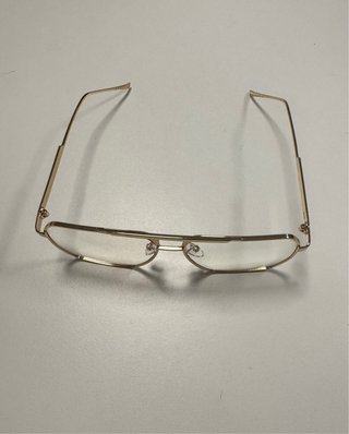 Montura de gafas doradas