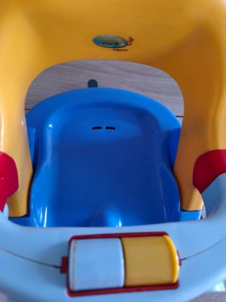 Asiento de bebé azul y amarillo
