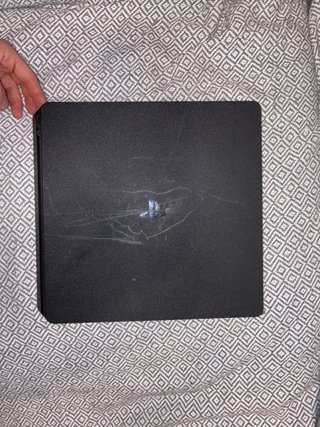 PS4 Slim 500GB + 2 mandos y 8 juegos