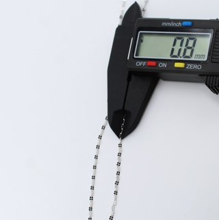 Cadena de oro blanco de 18k. Peso: 1.82 gr