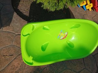 Bañera de bebé verde con patito