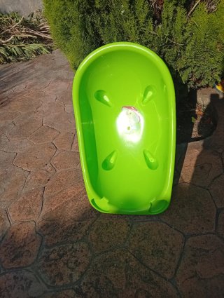 Bañera de bebé verde con patito