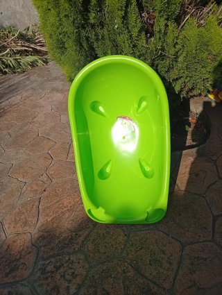 Bañera de bebé verde con patito
