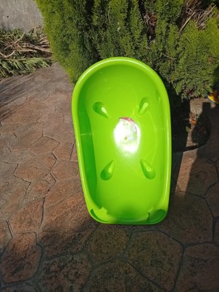 Bañera de bebé verde con patito