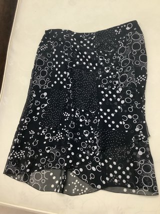 Falda estampada El Corte Inglés talla 54 negra