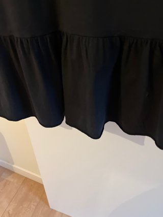 Vestido negro con estrella brillante