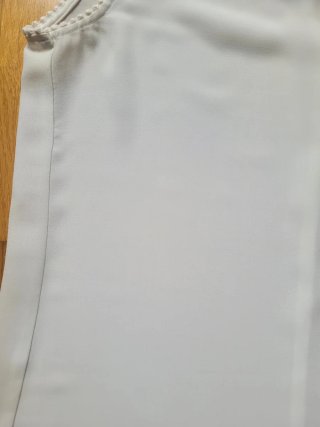 Top Stradivarius sin mangas blanco