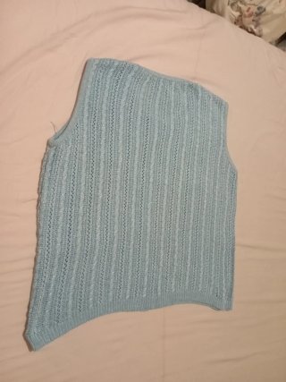 Maglia lavorata a macchina azzurra
