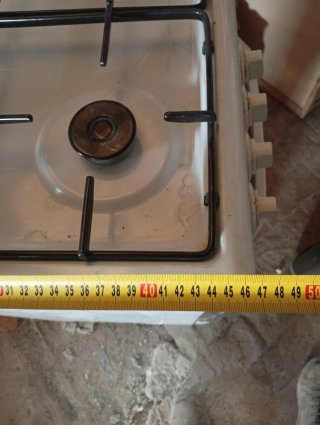 Cocina de gas butano blanca y negra