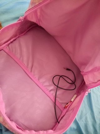 Mochila Porta lila y rosa seminueva
