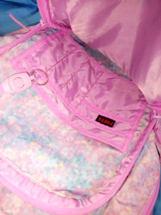 Mochila Porta lila y rosa seminueva