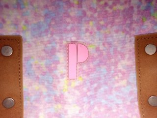 Mochila Porta lila y rosa seminueva