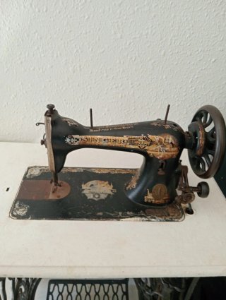 Máquina de coser Singer antigua manual