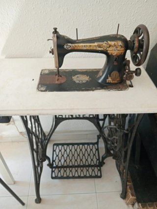 Máquina de coser Singer antigua manual