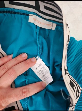 Pantalón ancho plisado