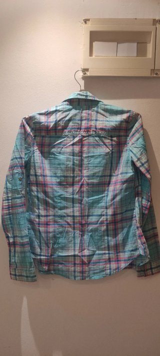 Blusa de cuadros rosa y turquesa