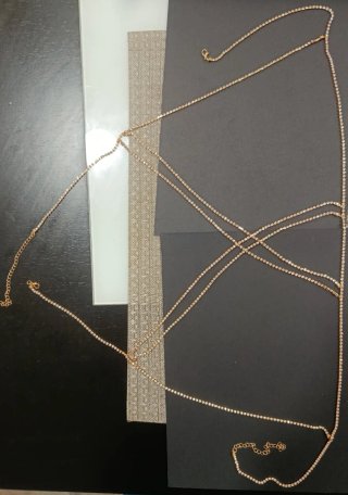 Cadena corporal dorada adorno escote