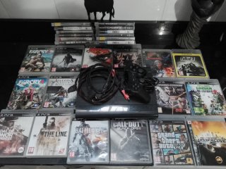 PS3 Super Slim Nera + Controller + 26 Giochi...
