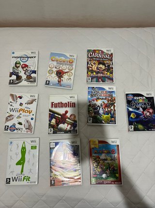 Pacchetto 8 Giochi Wii: Mario Kart, Wii Fit, Smash Bros