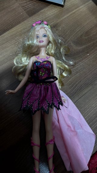 Lote: 11 Muñecas Barbie, patito feo y una pequeña