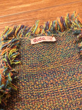 Cardigan fantasia con frange
