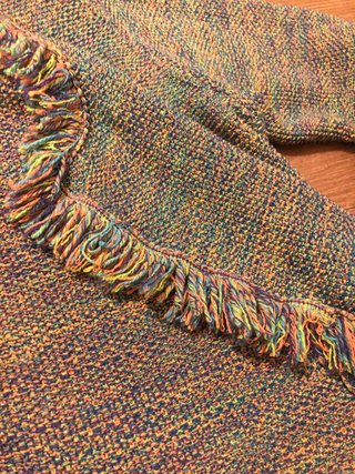 Cardigan fantasia con frange