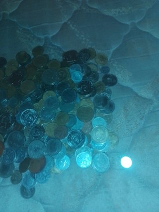 Lote de más de 100 monedas antiguas