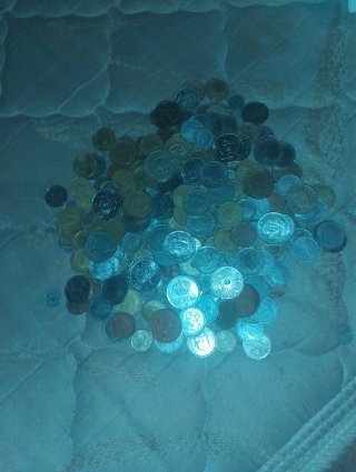 Lote de más de 100 monedas antiguas