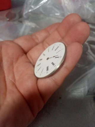 Esfera de reloj de bolsillo.