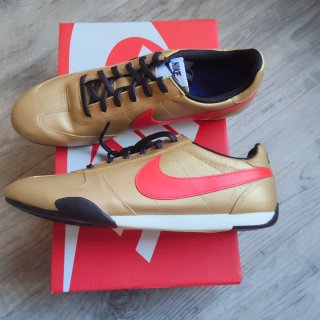Zapatillas Nike Sprint Doradas