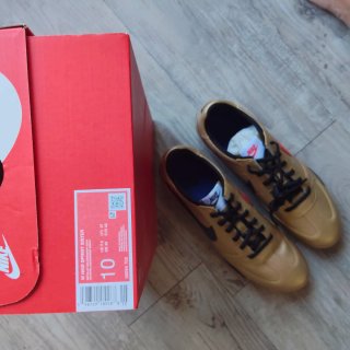 Zapatillas Nike Sprint Doradas