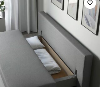 Sofá cama gris con almacenaje