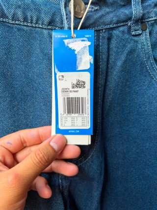 Jeans Adidas a righe
