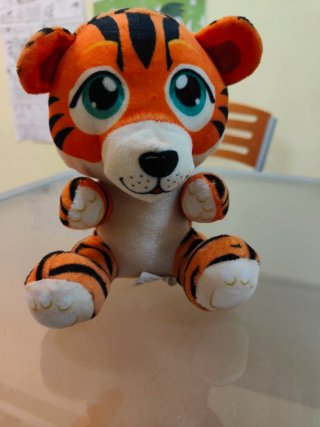 Tre peluche: Pulcino, Tigrotto, Lupetto