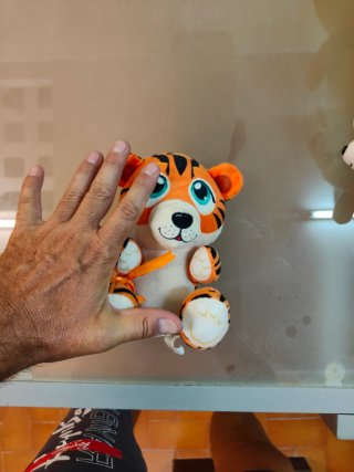 Tre peluche: Pulcino, Tigrotto, Lupetto