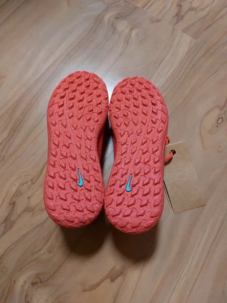 Scarpe da calcio Nike bambino rosse e turchese